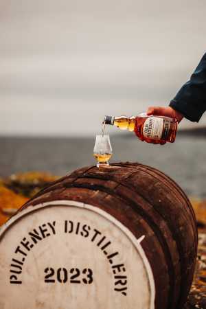 Old Pulteney 12yo pouring shot at sea
